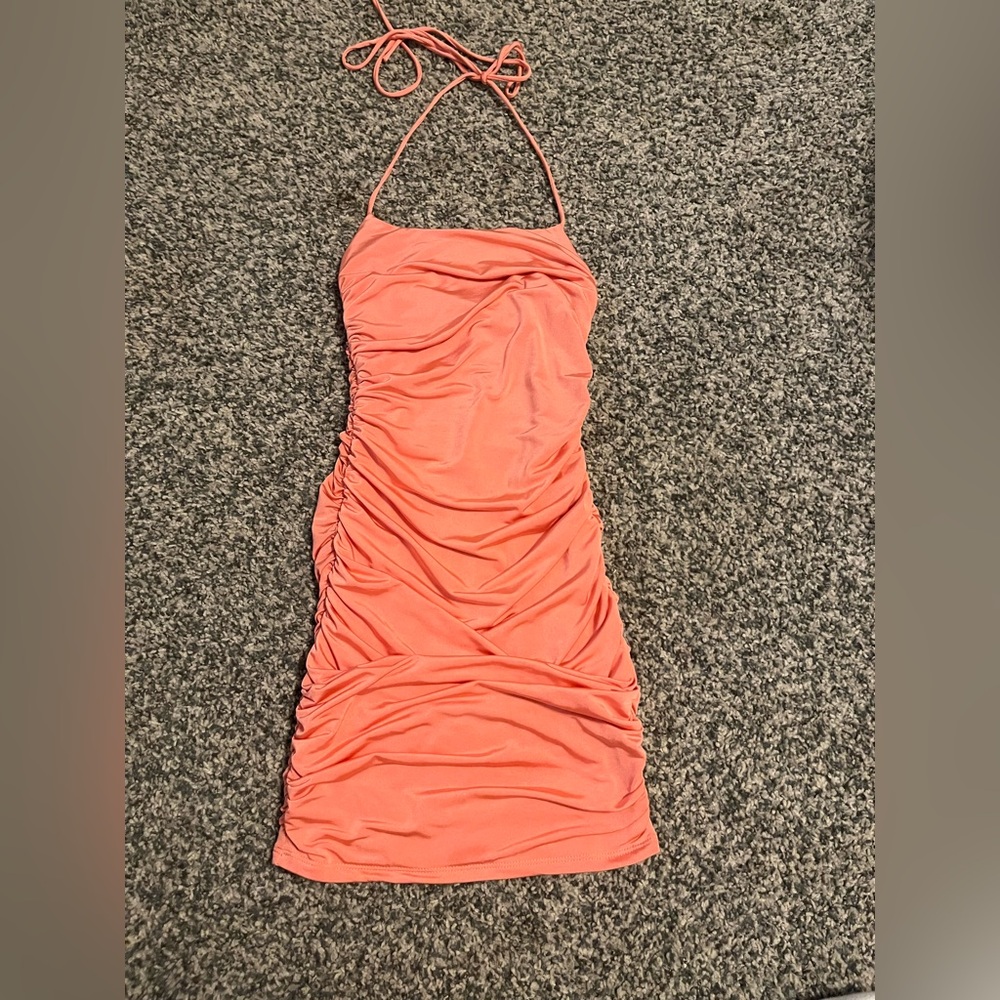 Peach colored tight halter dress